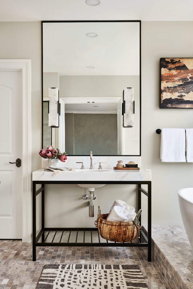 Inspiration for a large transitional master bathroom in Portland with black cabinets, a two-piece toilet, white tile, marble, white walls, a console sink, marble benchtops and white benchtops.