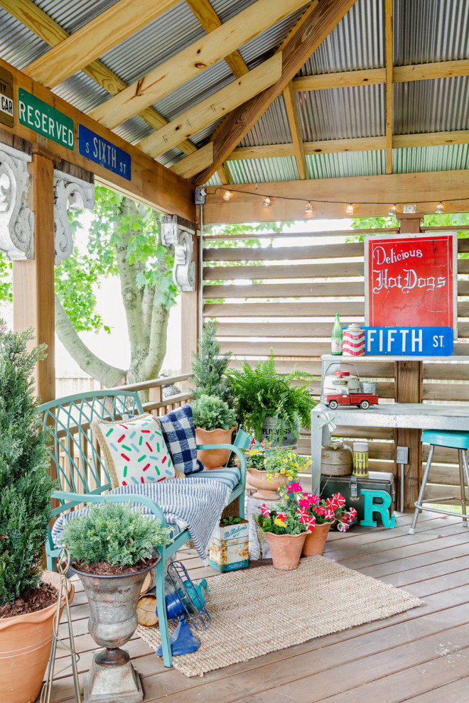 Inspiration for an eclectic wood railing deck remodel in Chicago