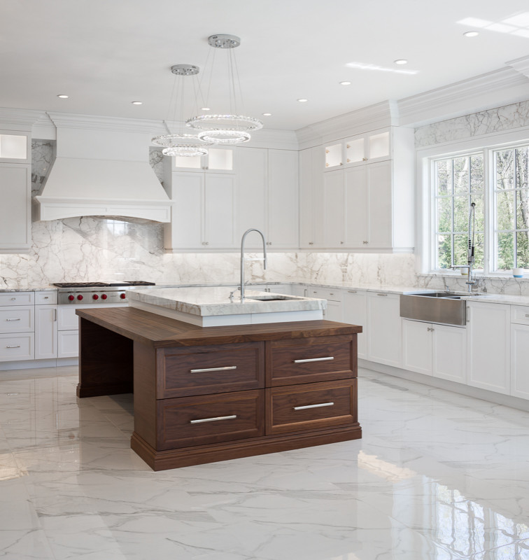 Photo of a large transitional eat-in kitchen in New York with a drop-in sink, shaker cabinets, white cabinets, marble benchtops, multi-coloured splashback, marble splashback, stainless steel appliances, marble floors, with island, multi-coloured floor and multi-coloured benchtop.