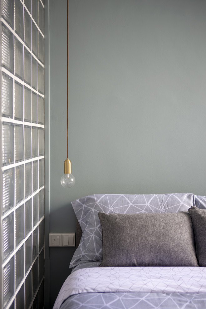Photo of a Scandinavian bedroom in Singapore.