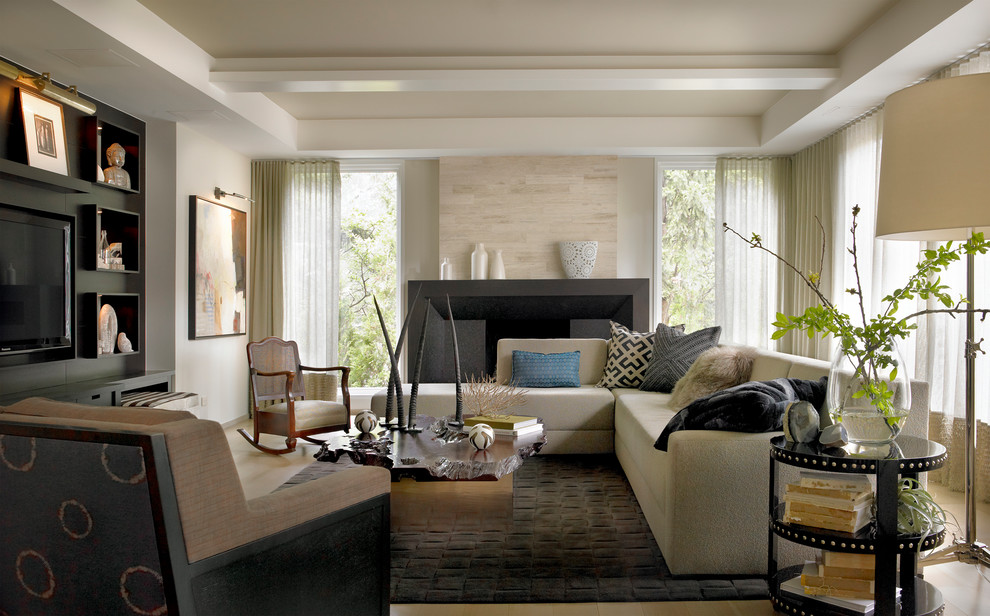 Inspiration for a contemporary family room in Chicago with beige walls and a built-in media wall.