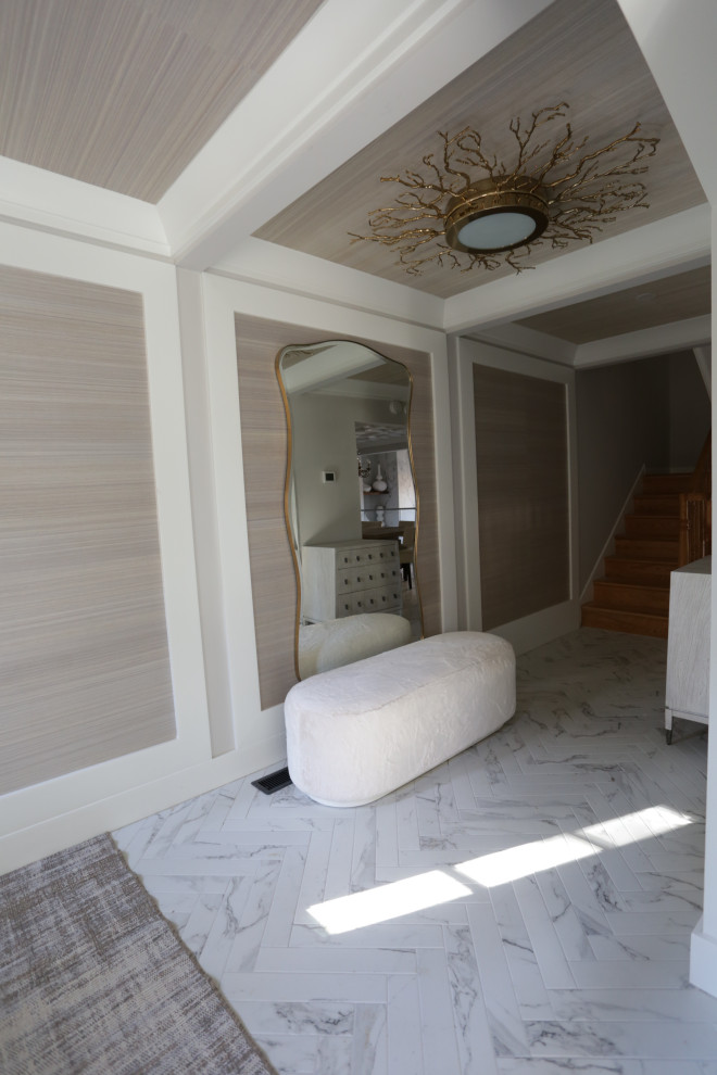 Inspiration for a mid-sized transitional l-shaped marble floor, white floor and exposed beam kitchen remodel in DC Metro with an undermount sink, shaker cabinets, white cabinets, quartzite countertops, white backsplash, quartz backsplash and stainless steel appliances