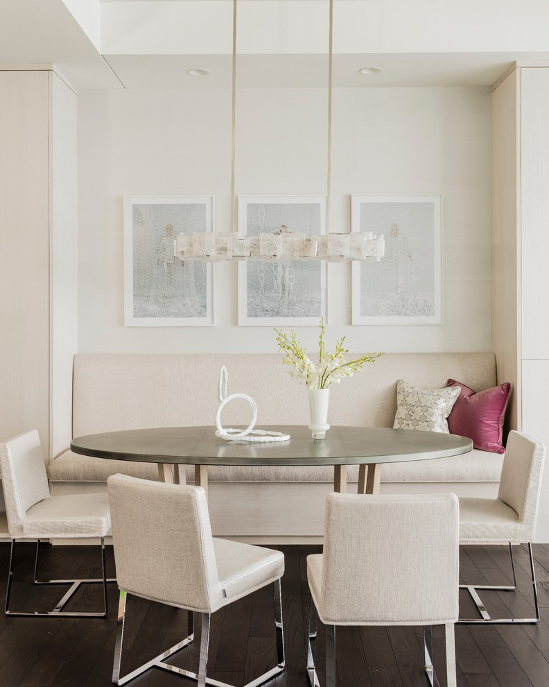 Large contemporary dining room in Boston with white walls, dark hardwood floors and a ribbon fireplace.