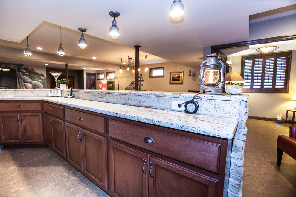 This is an example of a large country look-out basement in St Louis with grey walls.