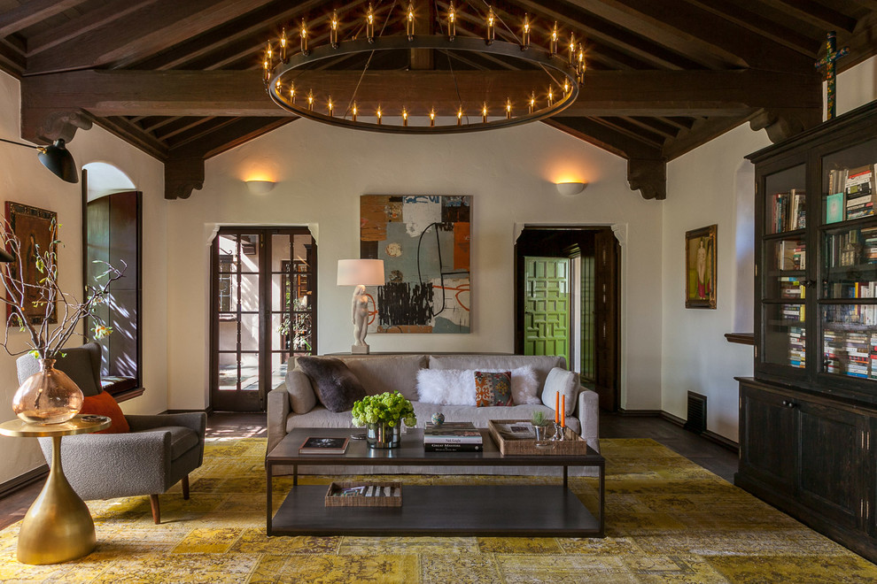 Inspiration for a huge mediterranean enclosed dark wood floor living room library remodel in San Francisco with white walls and no tv