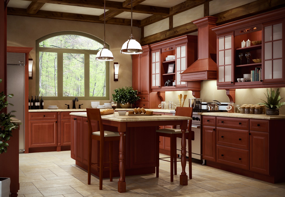 Inspiration for a mid-sized transitional u-shaped travertine floor and beige floor enclosed kitchen remodel with granite countertops, stainless steel appliances, an island, an undermount sink, raised-panel cabinets and dark wood cabinets