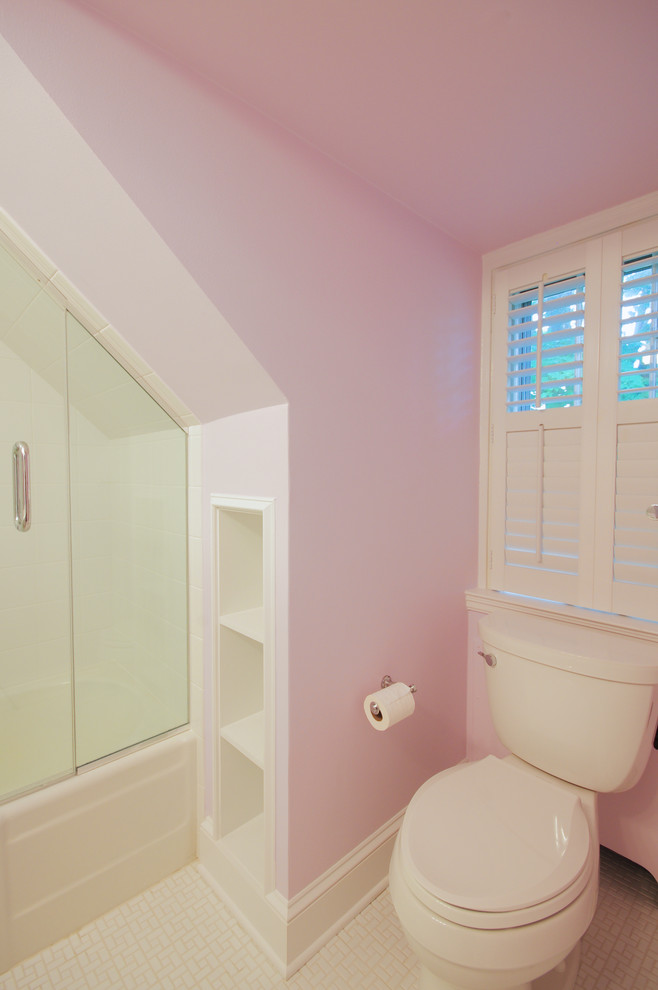 Inspiration for a small traditional kids bathroom in Baltimore with an alcove tub, a shower/bathtub combo, a two-piece toilet, white tile, porcelain tile, pink walls and ceramic floors.