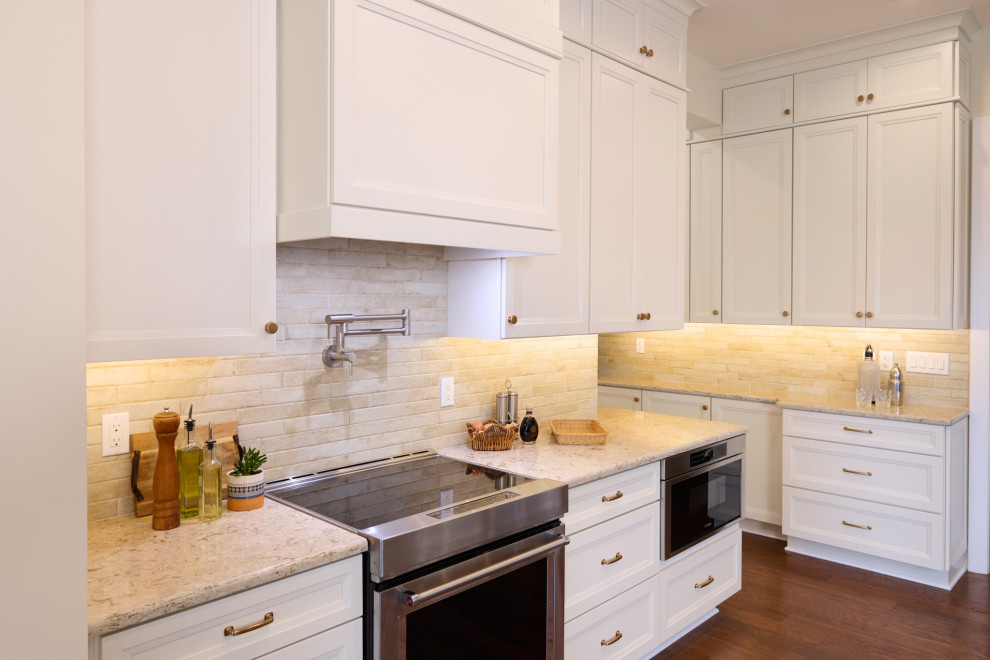 Example of a huge transitional u-shaped open concept kitchen design in DC Metro with a drop-in sink, recessed-panel cabinets, quartz countertops, multicolored backsplash, stainless steel appliances and an island