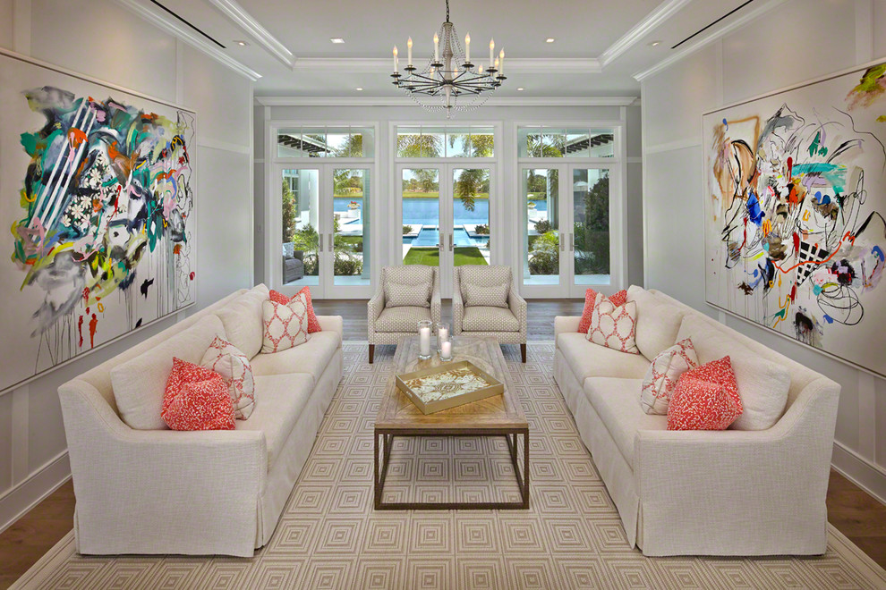 Inspiration for a transitional living room in Miami with white walls, medium hardwood floors and purple floor.