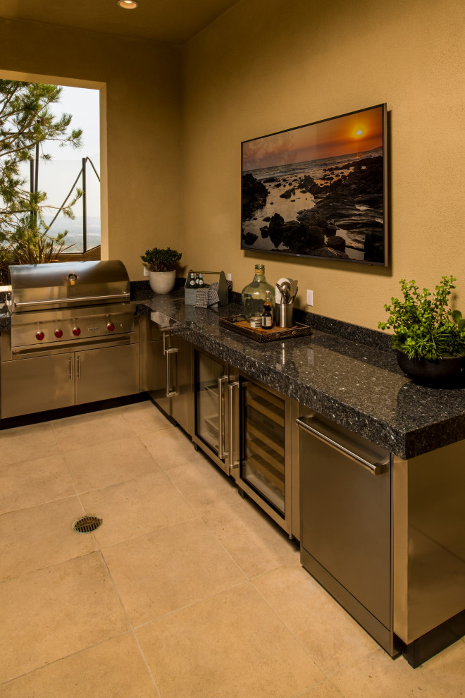 Example of a transitional home design design in Miami