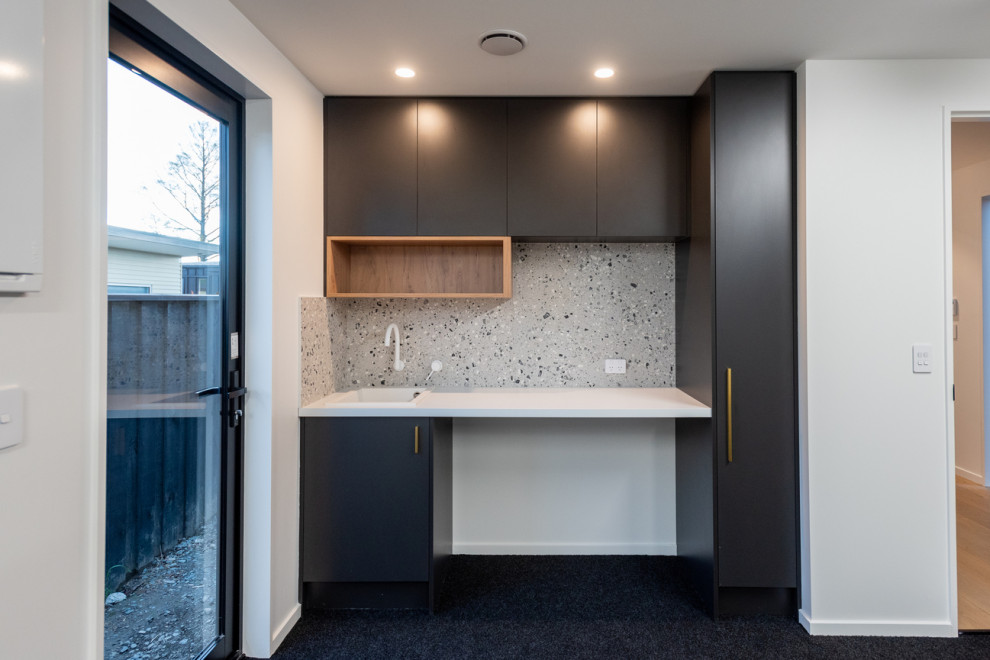 Laundry room - modern laundry room idea in Christchurch