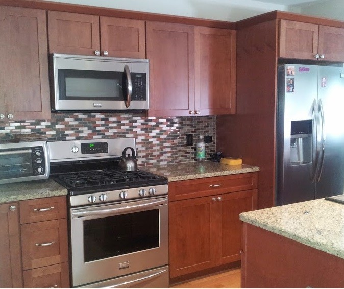 Example of a transitional kitchen design in New York