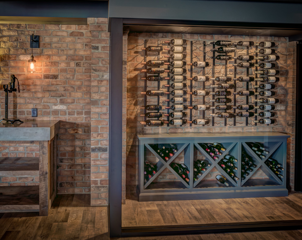 Design ideas for a country wine cellar in Cleveland with vinyl floors and diamond bins.