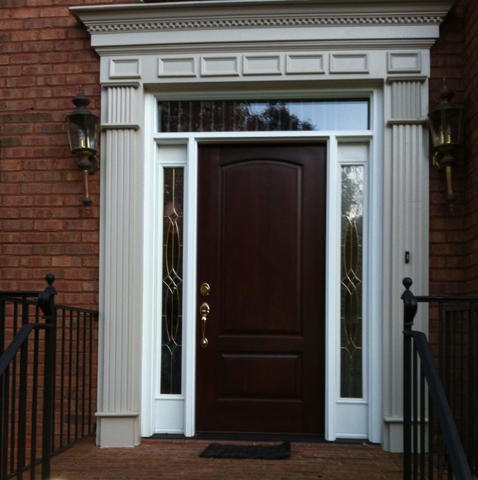 Large traditional front door in Atlanta with a single front door and a brown front door.