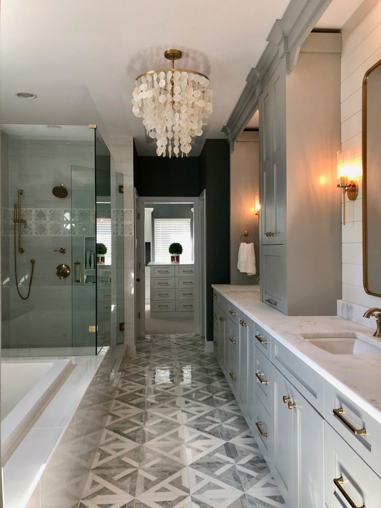 Design ideas for a mid-sized midcentury master bathroom in Charlotte with flat-panel cabinets, grey cabinets, a drop-in tub, a corner shower, gray tile, porcelain tile, grey walls, marble floors, an undermount sink, marble benchtops, multi-coloured floor, a hinged shower door, white benchtops, a shower seat, a double vanity, a built-in vanity and planked wall panelling.