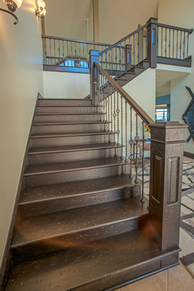 Inspiration for a large craftsman wooden l-shaped mixed material railing staircase remodel with wooden risers