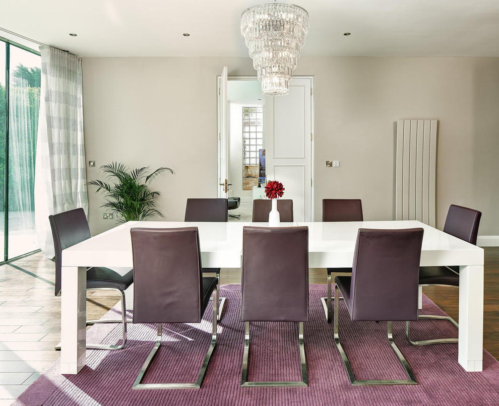 Photo of a large transitional separate dining room in Dublin with beige walls and no fireplace.