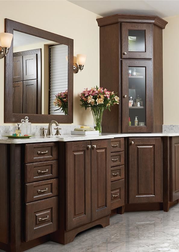 Inspiration for a mid-sized timeless master porcelain tile and gray floor bathroom remodel in Orange County with raised-panel cabinets, dark wood cabinets, beige walls, an undermount sink and marble countertops