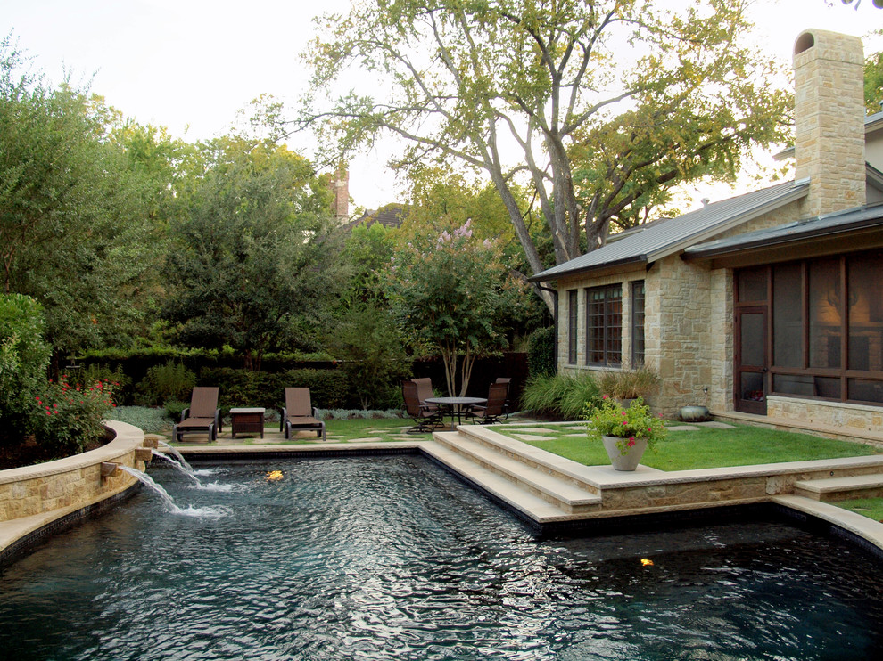 Traditional backyard custom-shaped pool in Austin.