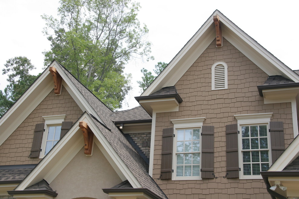 Mountain style home design photo in Raleigh