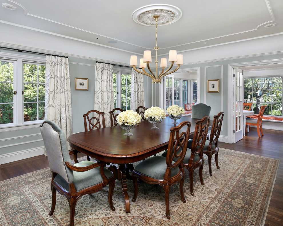Inspiration for a large traditional separate dining room in San Francisco with grey walls, dark hardwood floors, no fireplace and brown floor.
