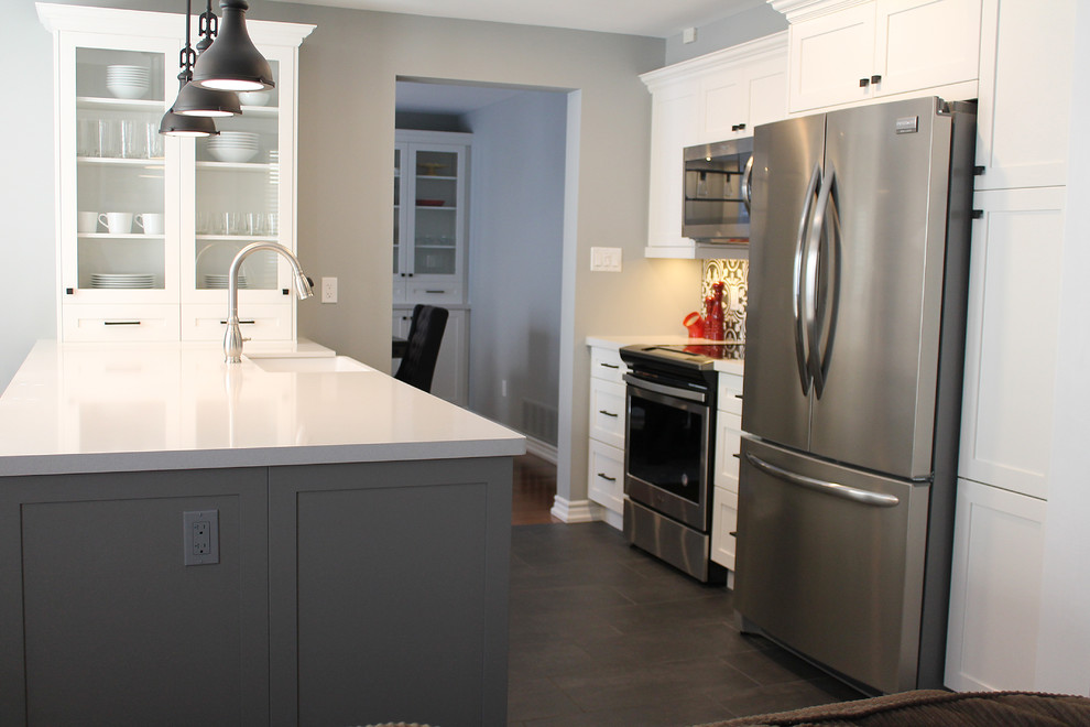 Example of a transitional kitchen design in Toronto