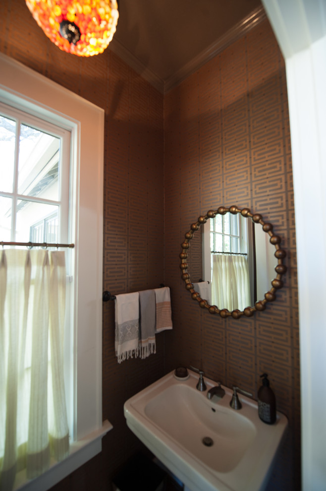 Design ideas for a transitional powder room in Austin with medium hardwood floors.