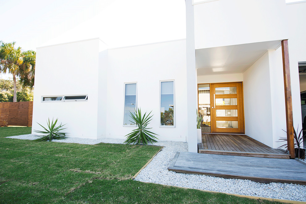 This is an example of a mid-sized scandinavian one-storey exterior in Sunshine Coast.