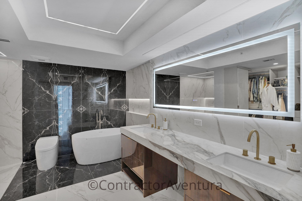 Example of a trendy home design design in Miami