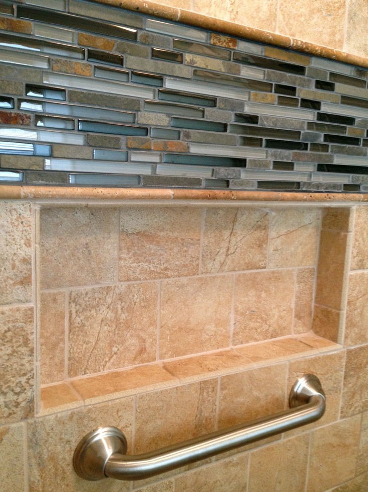 Inspiration for a mid-sized transitional master beige tile and porcelain tile porcelain tile alcove shower remodel with raised-panel cabinets, white cabinets, a two-piece toilet and blue walls