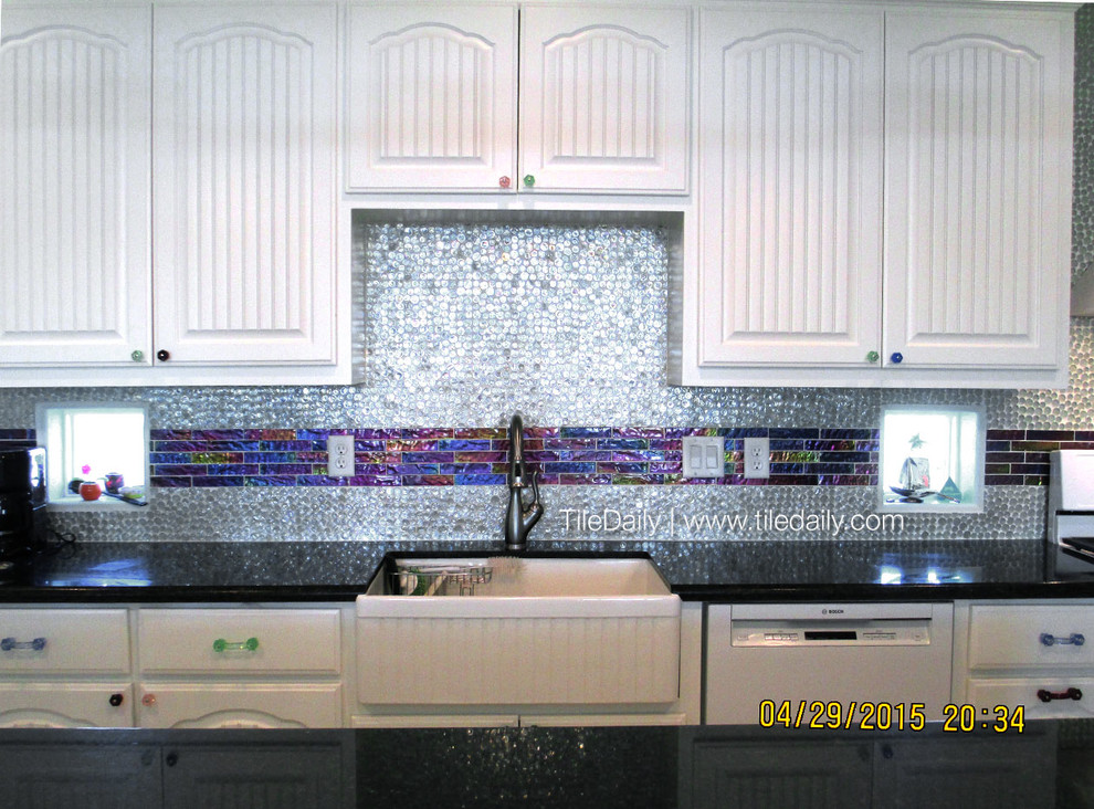 Kitchen - modern kitchen idea with white backsplash and glass tile backsplash