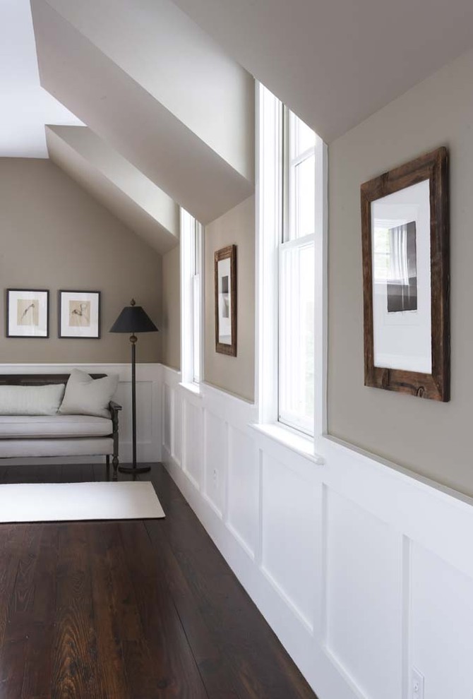 Inspiration for a large traditional hallway in Charleston with beige walls, dark hardwood floors and brown floor.