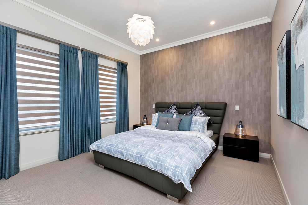 This is an example of a mid-sized contemporary guest bedroom in Perth with beige walls, carpet and beige floor.