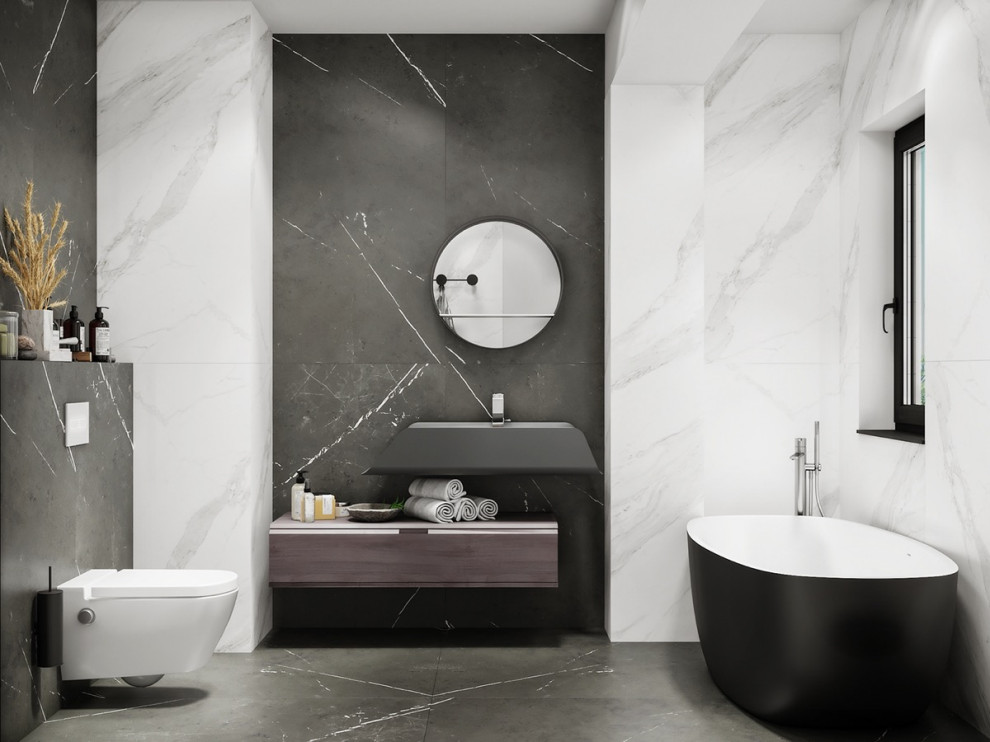 Mid-sized contemporary master bathroom in Other with grey cabinets, a freestanding tub, a wall-mount toilet, black and white tile, porcelain tile, black walls, porcelain floors, a wall-mount sink, black floor, a single vanity and a floating vanity.