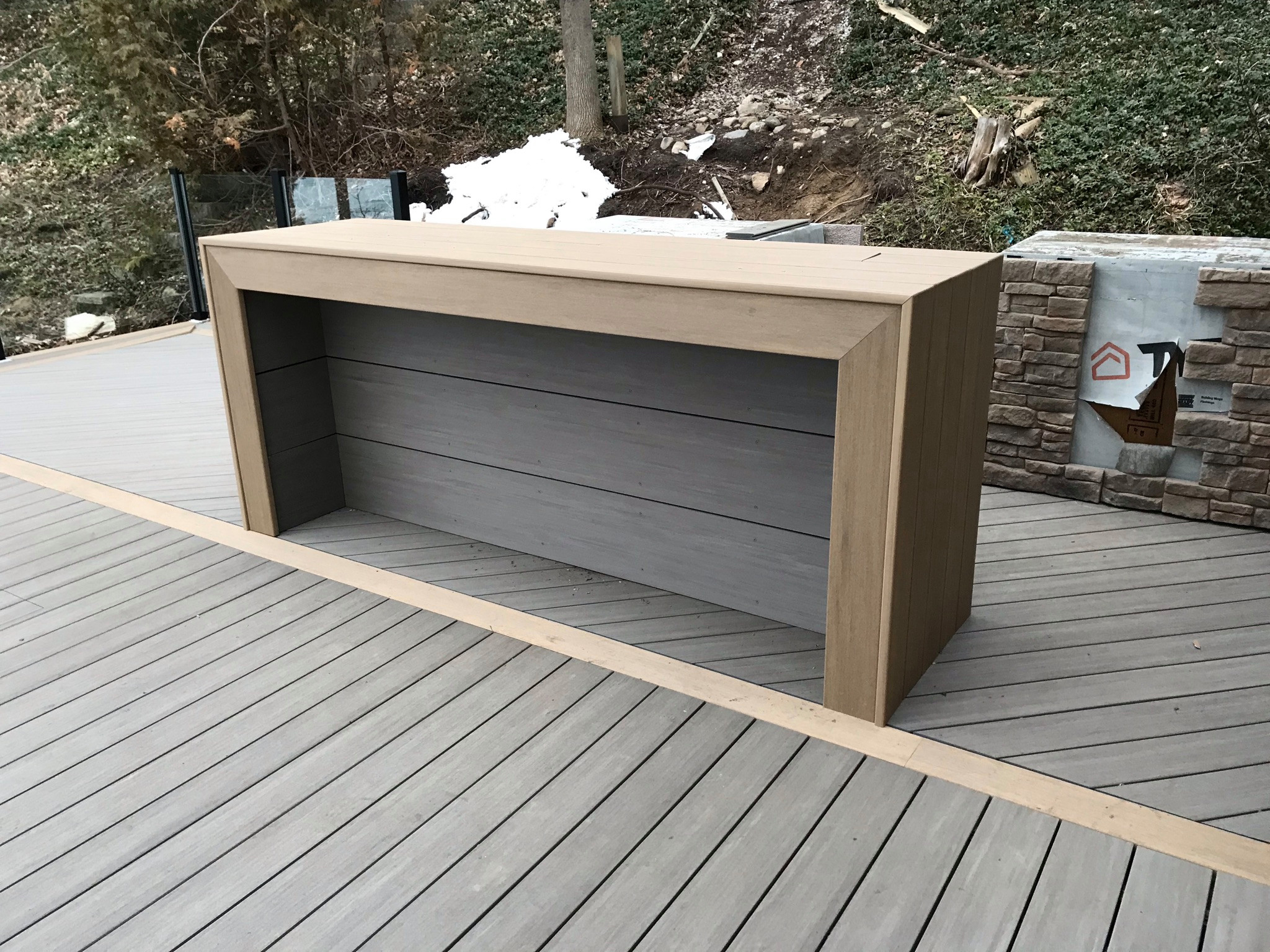 Two tier Deck with bar and outdoor kitchen