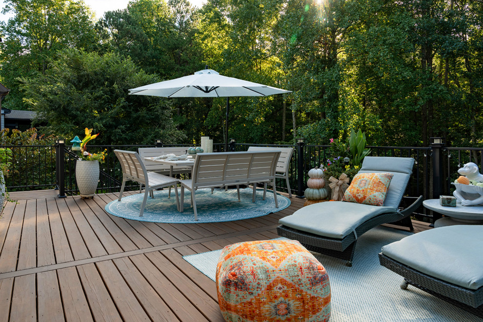 Deck - transitional backyard second story metal railing deck idea in Atlanta with a bbq area and no cover
