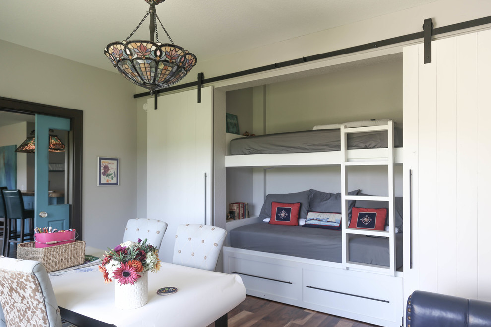 Inspiration for a large transitional guest medium tone wood floor and brown floor home design remodel with white walls