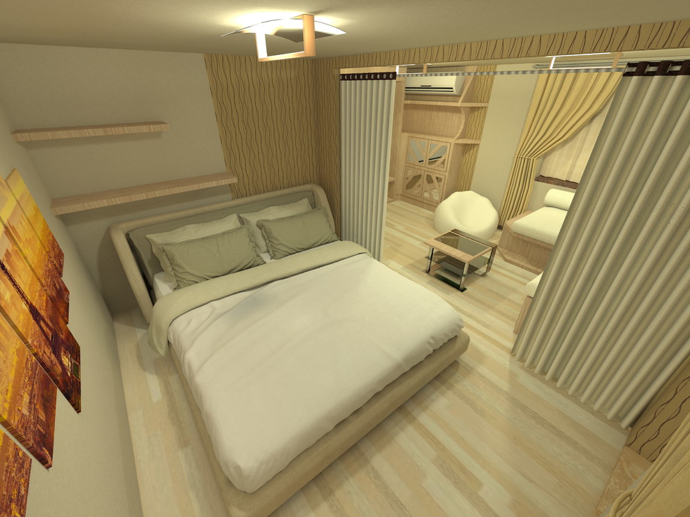 Интерьер комнаты совмещающей в себе спальню и зону отдыха.