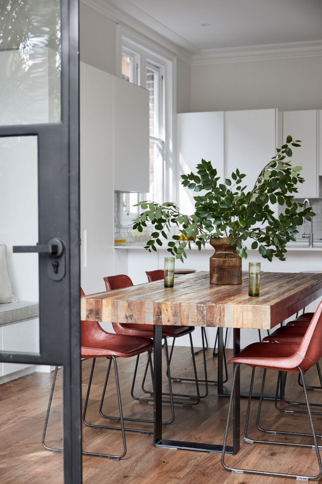 This is an example of a traditional dining room in Sydney.