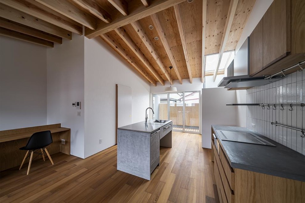 他の地域にあるアジアンスタイルのおしゃれなキッチンの写真