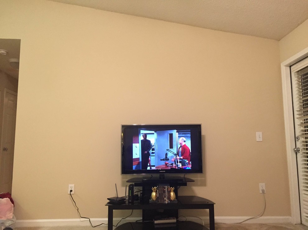How to decorate around my tv & stand with a vaulted cieling?