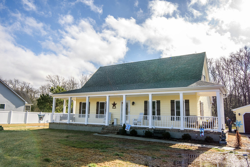 Coastal home with new windows and cedar impression siding
