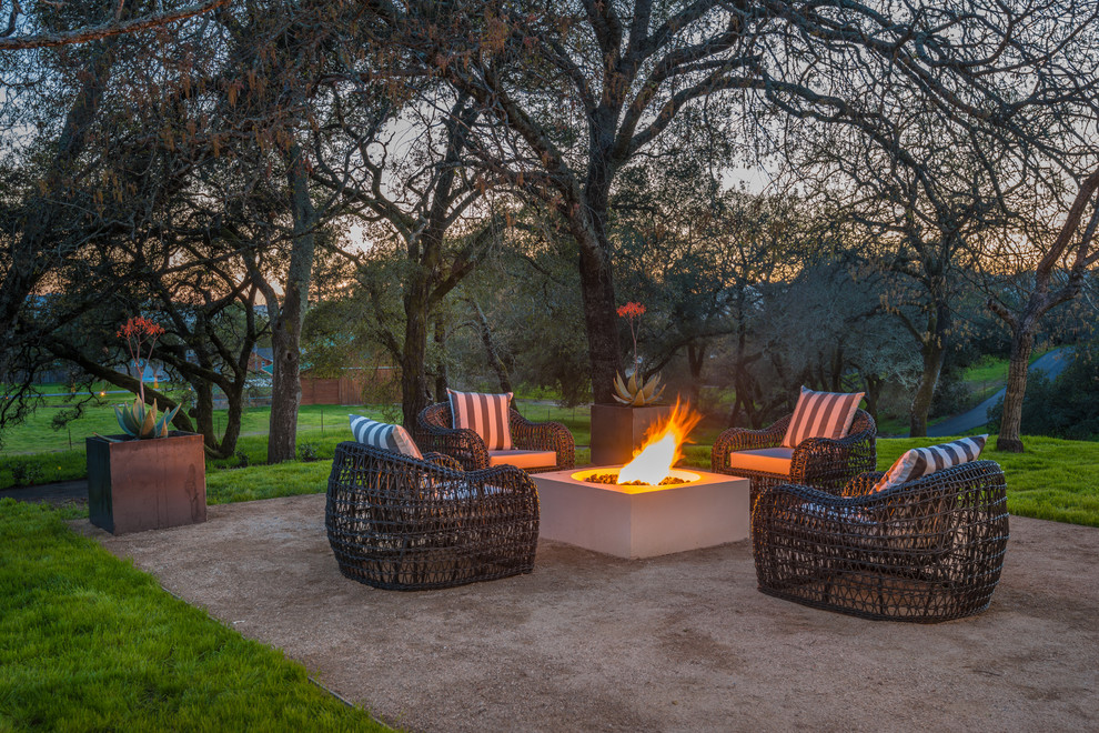 Photo of a country patio in San Francisco with a fire feature, decomposed granite and no cover.