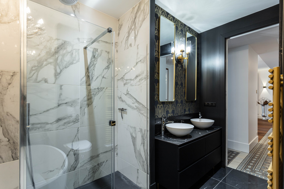 This is an example of a mid-sized contemporary 3/4 bathroom in Grenoble with flat-panel cabinets, black cabinets, a corner shower, black tile, black walls, a vessel sink, black floor, a sliding shower screen and black benchtops.