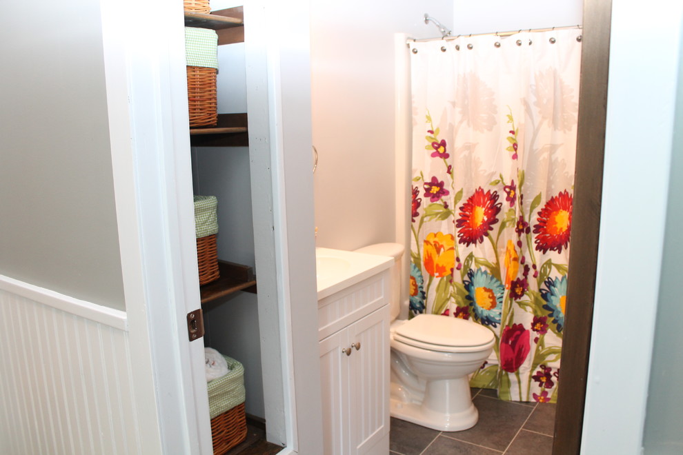 Example of a mid-sized transitional home design design in New York