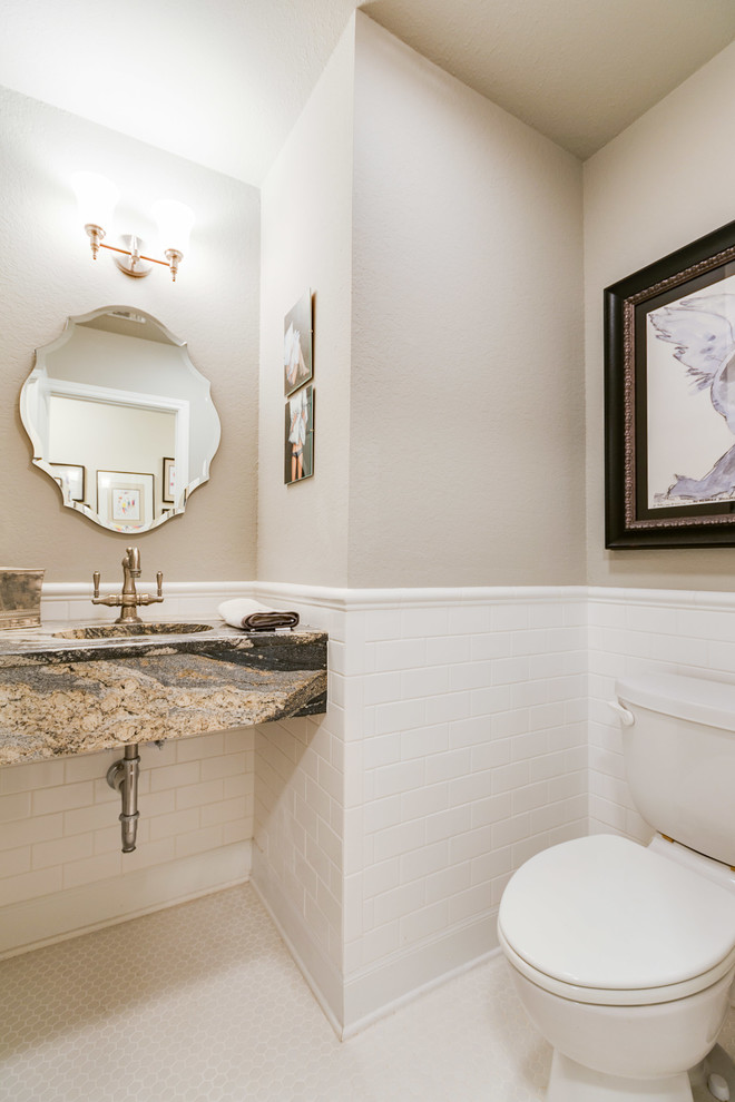 Traditional powder room in Dallas with white tile, subway tile, granite benchtops, white floor, beige walls, mosaic tile floors, an integrated sink, multi-coloured benchtops and louvered cabinets.