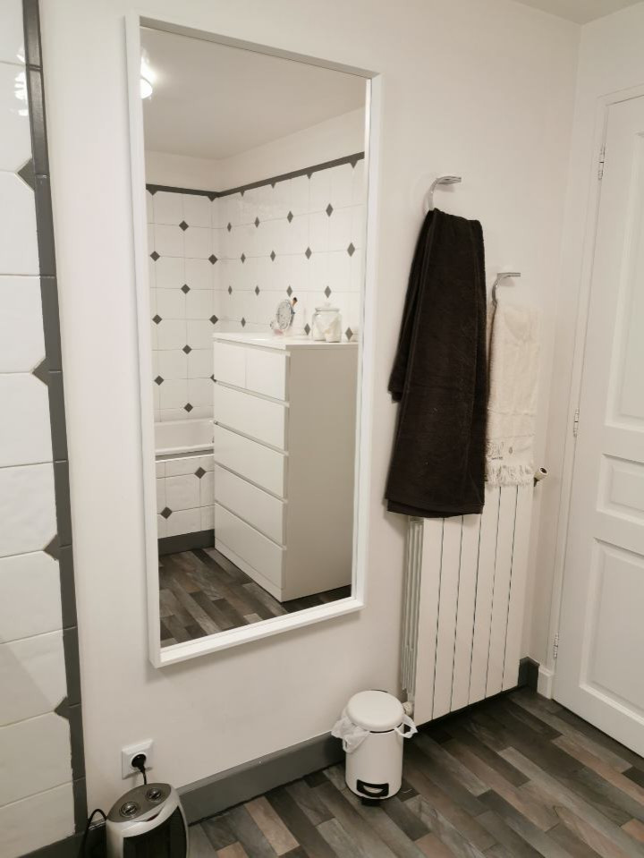 Grey and white wet room bathroom in Montpellier with white cabinets, a submerged bath, white tiles, ceramic tiles, white walls, lino flooring, a submerged sink, tiled worktops, grey floors, a hinged door, grey worktops, double sinks and a built in vanity unit.