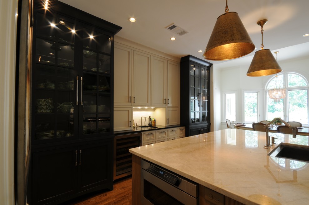Example of a large transitional u-shaped dark wood floor and brown floor open concept kitchen design in Birmingham with an undermount sink, shaker cabinets, white cabinets, granite countertops, white backsplash, mosaic tile backsplash, paneled appliances and an island