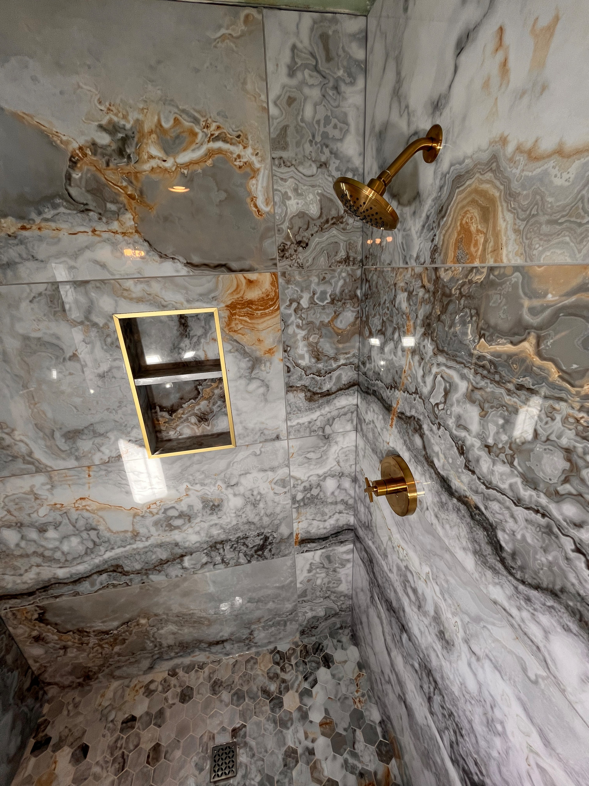 Shower reniovation: Gianni Griggio polished porcelain tile 24 x 48