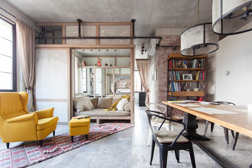 Industrial formal open concept living room in Moscow with no tv and white walls.